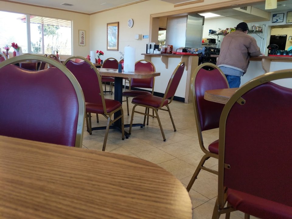 Breakfast dishes served in a plain setting.