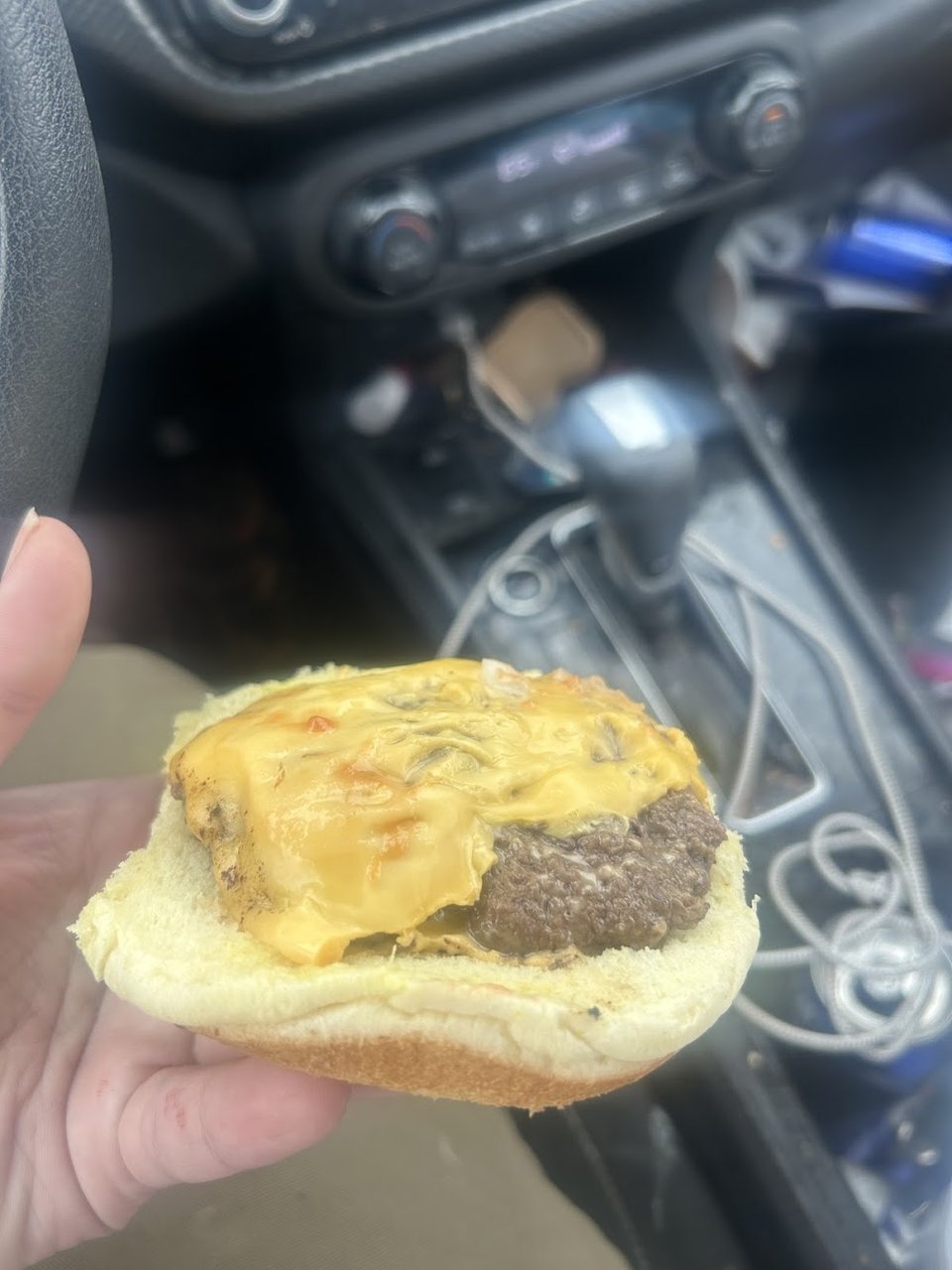 Printed menu with burgers, salads, and sides.